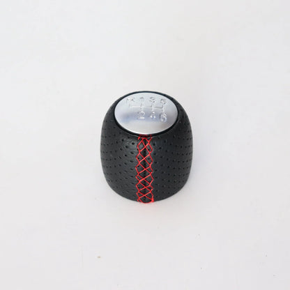 Alpha vehicle shift handball with wrapped perforated leather in black, red, or white line colours