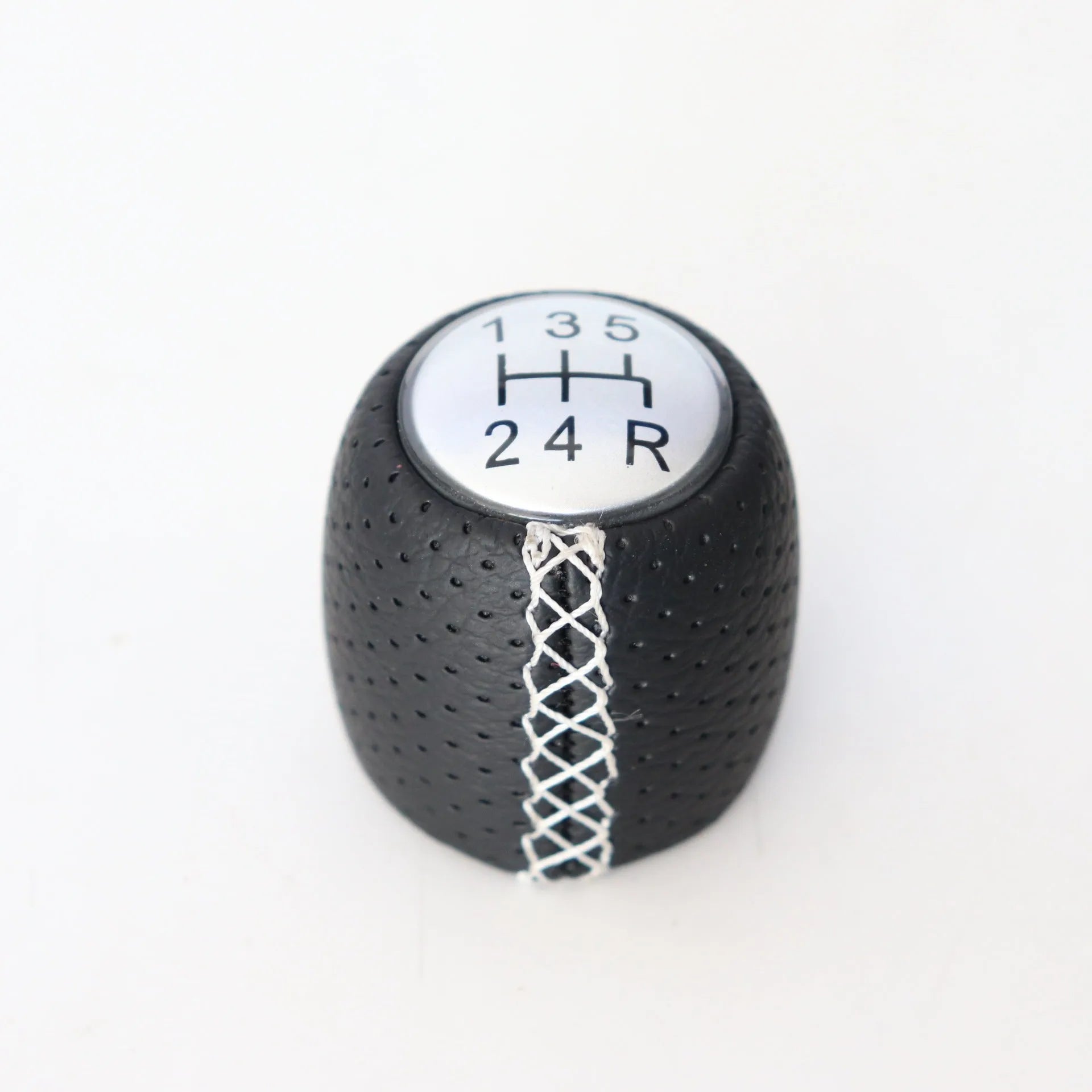Alpha vehicle shift handball with wrapped perforated leather in black, red, or white line colours