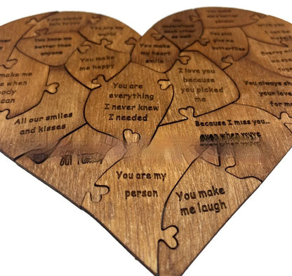 Wooden heart puzzle with love messages for romantic gifts, light brown color.