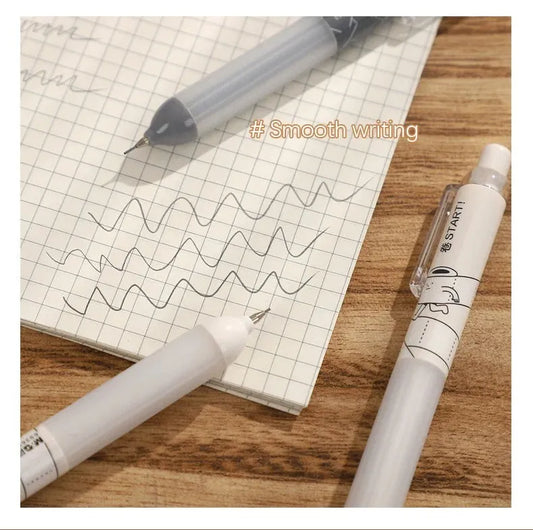 Black and white automatic pencils showing 0.5mm lead tip with minimalist plastic barrel design