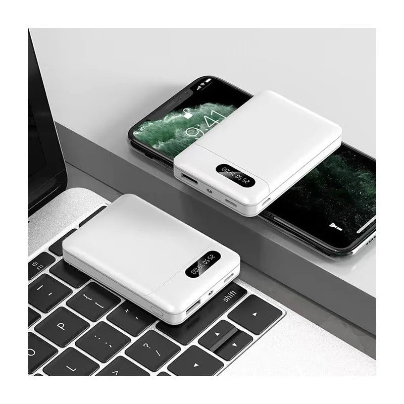 White or black large capacity portable power bank showing dimensions and USB output port.