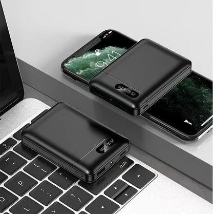 White or black large capacity portable power bank showing dimensions and USB output port.