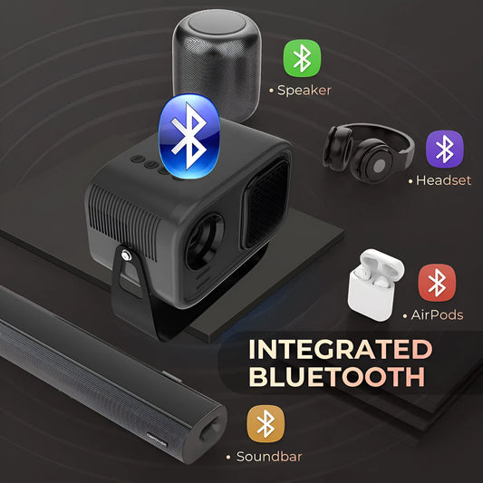 Black HD smart portable projector with remote control and cables on a table