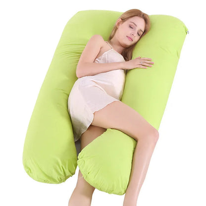 Large U-shaped pregnancy support pillow with removable cover and abdominal support belt.