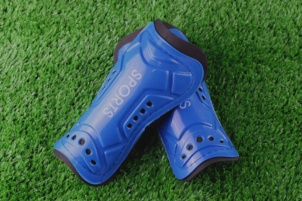 Football strap shin guards in multiple colors for secure leg protection