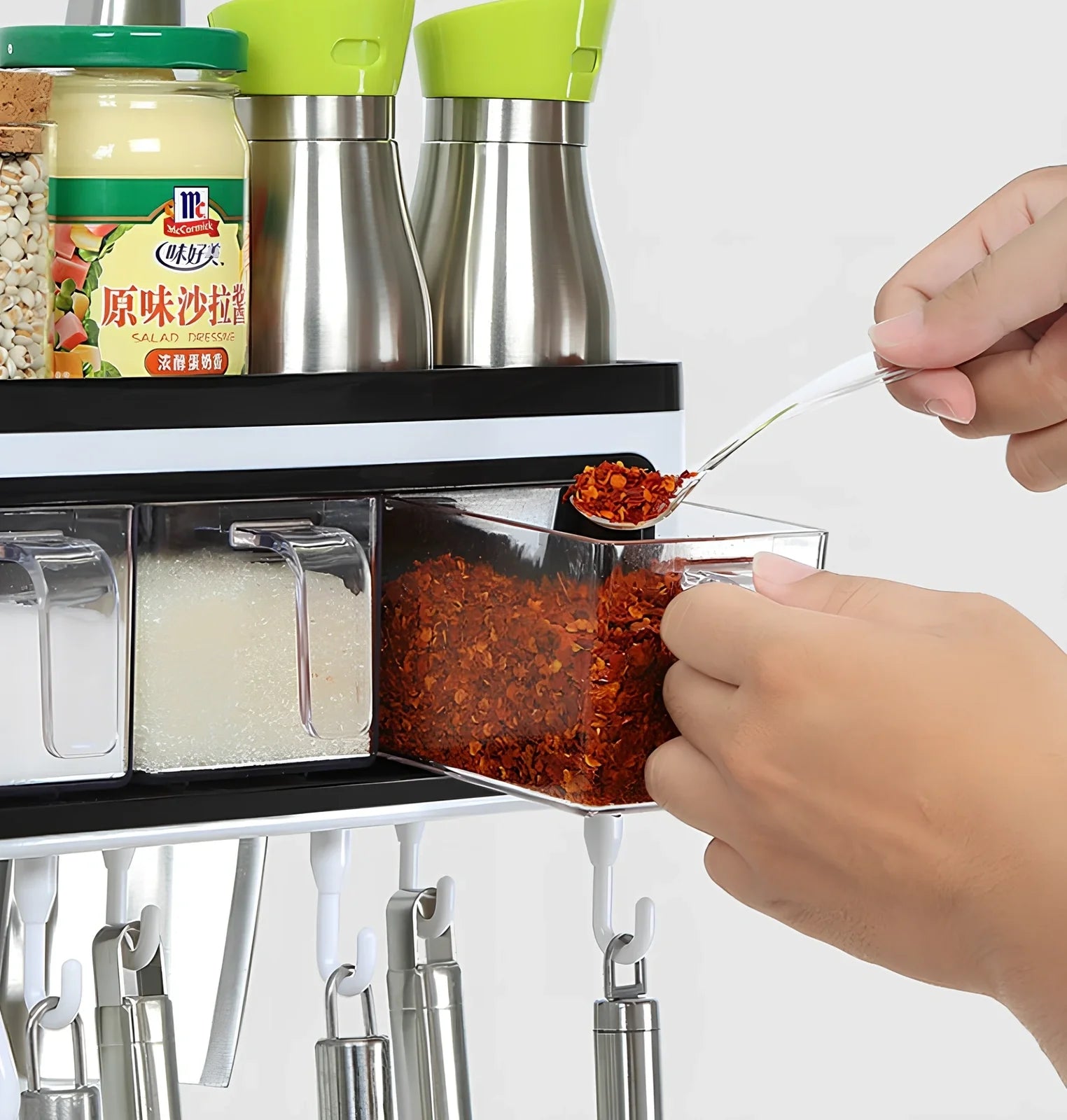 White wall-mounted plastic kitchen storage box for organising tools and utensils