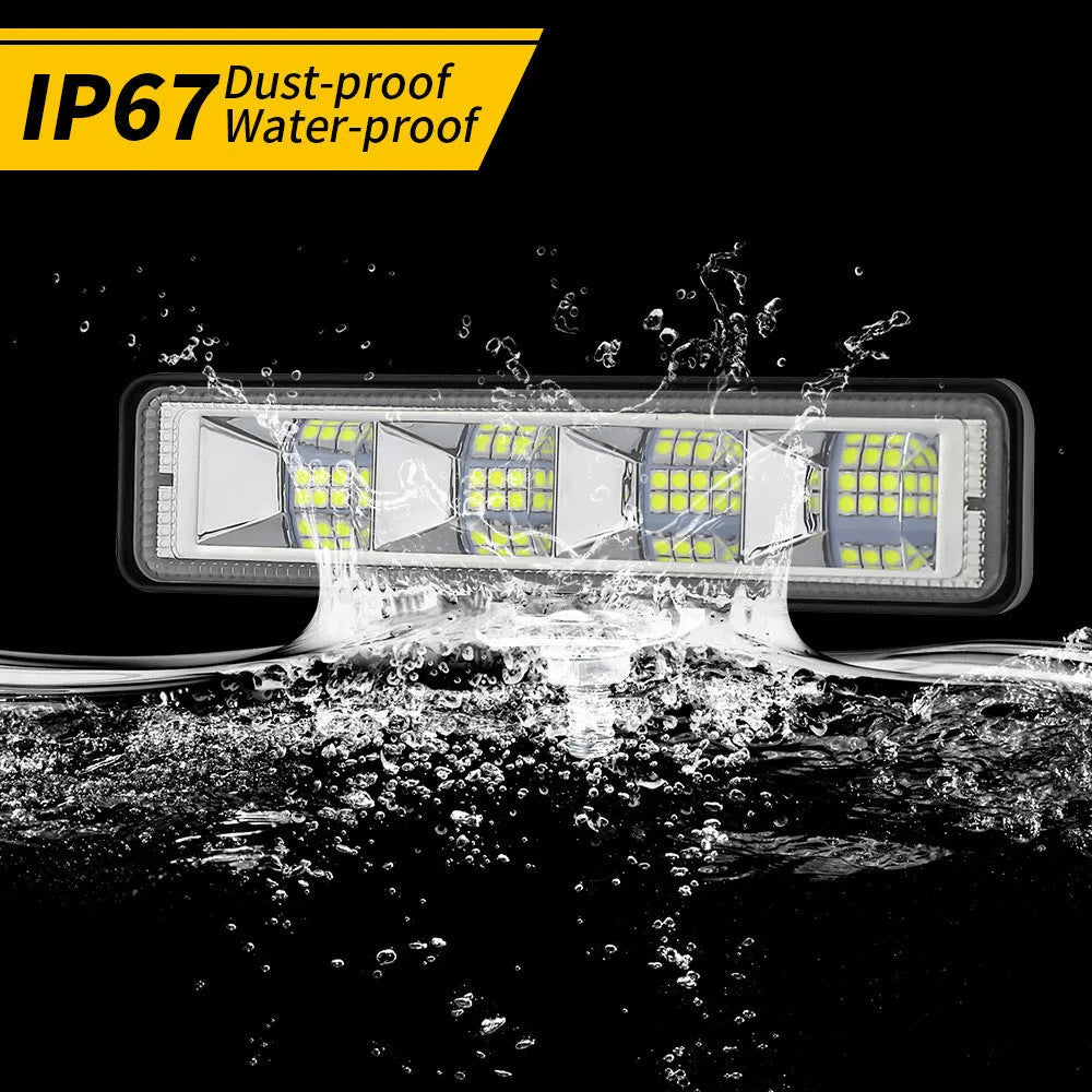 Pack of four rectangular aluminium LED work lights for car and truck modification.