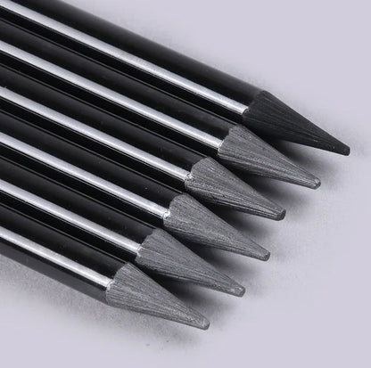 Carbonized Pencil Suit with six graphite and three carbonized pencils on suction card packaging