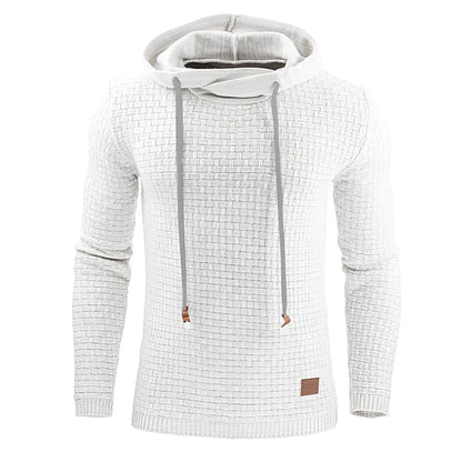 Man wearing a cotton-polyester blend hooded sweatshirt in grey, showing the front design and hood.