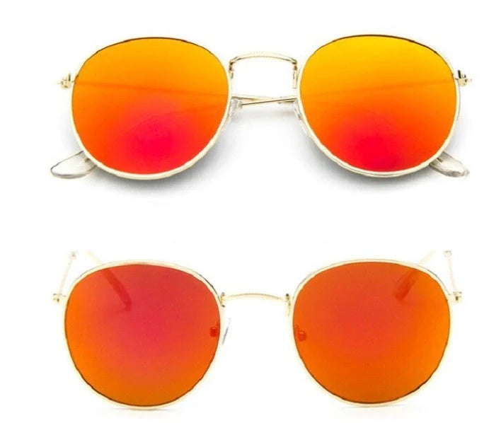 Stylish women's retro sunglasses with round frame and metal finish