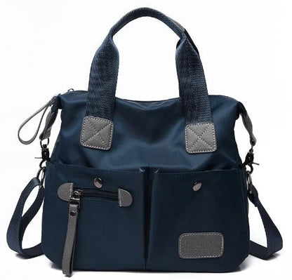 Versatile ladies handbag in various colors with multiple carry options, including handbag, shoulder bag, and crossbody styles, featuring durable construction and organizational pockets.