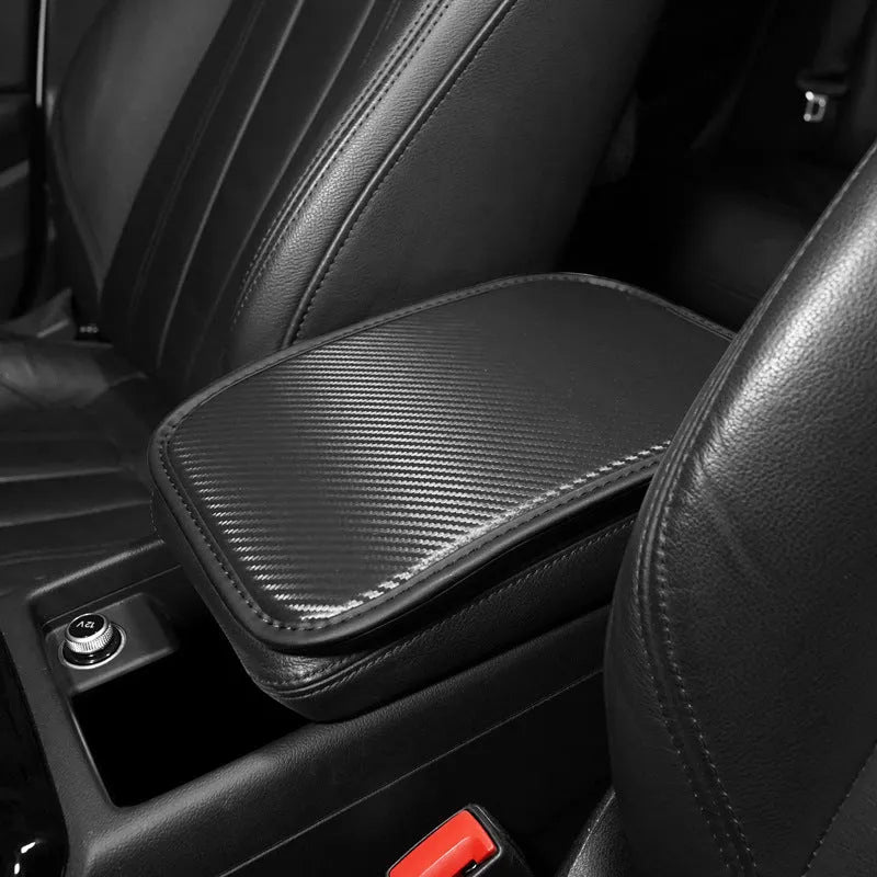 Universal leather car armrest cushion mat for centre console tray, shown in black colour, dimensions 29x19 cm.