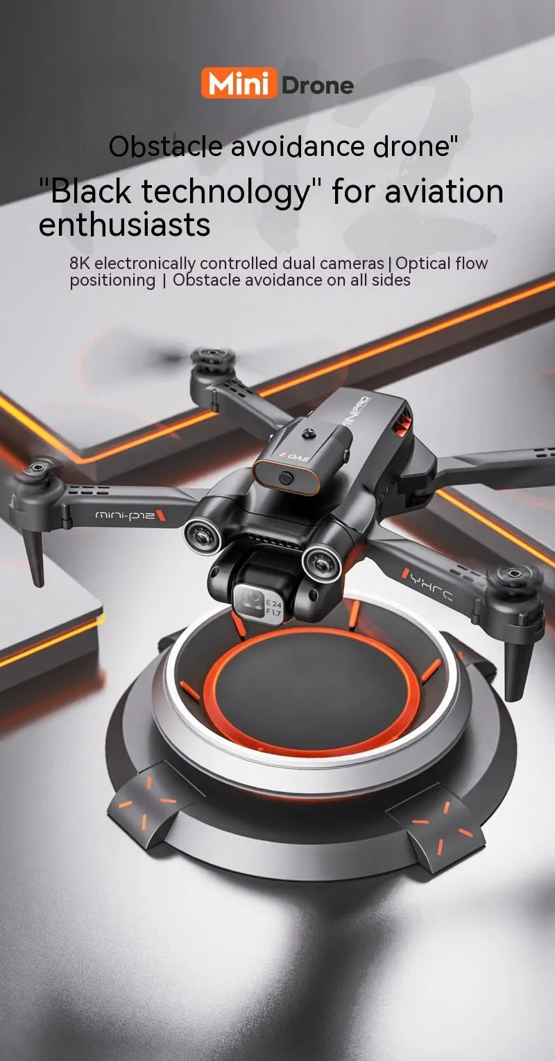 Black P12 quadcopter drone with folded arms next to its remote control and HD camera.