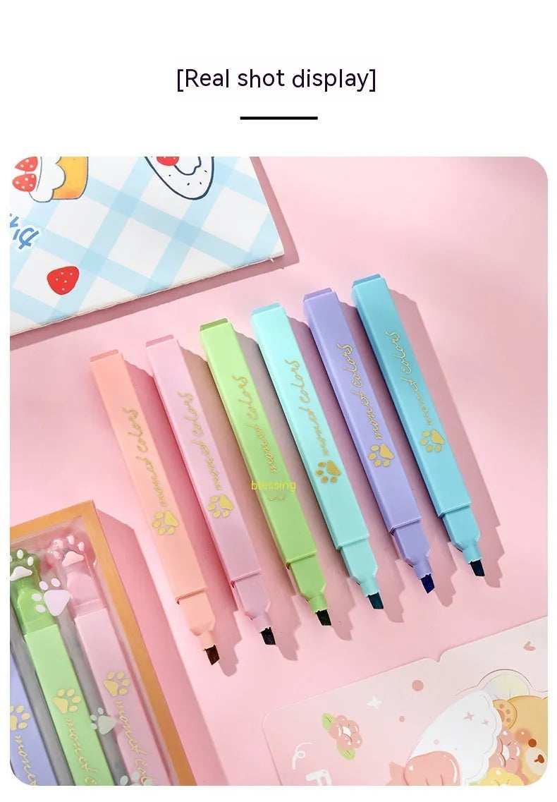 Cat's Paw fluorescent marking pen gift set, box open showing six pens with oblique heads.