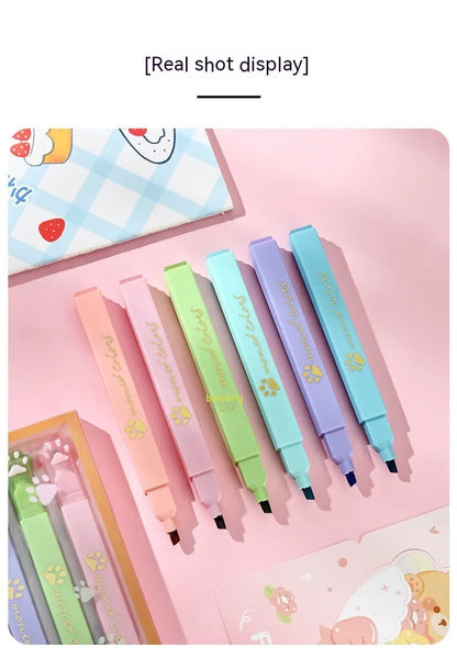Cat's Paw fluorescent marking pen gift set, box open showing six pens with oblique heads.