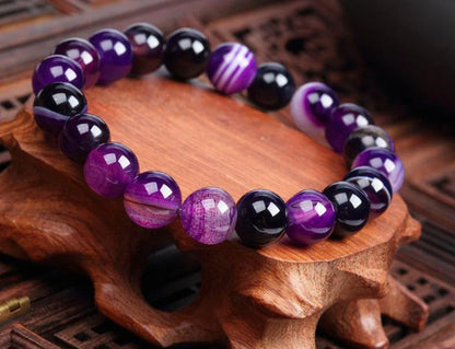 Handcrafted black lava beaded bracelet with seven chakra stones for healing and balance