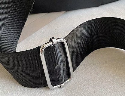 Trendy women's travel backpack in black and brown, featuring large capacity and waterproof material