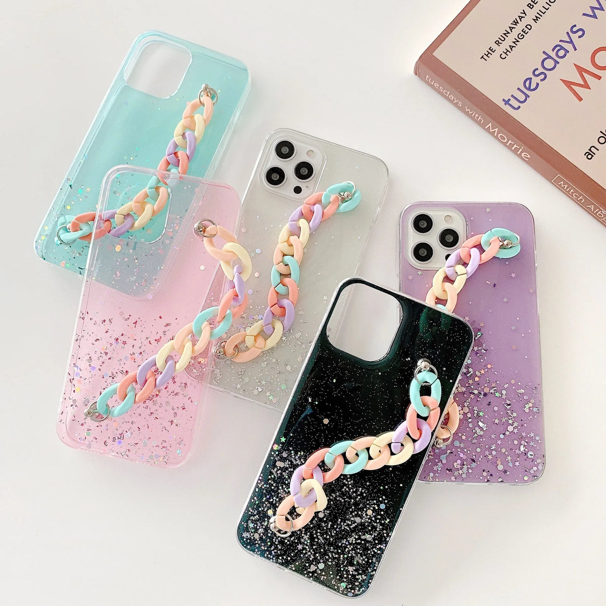 Silicone soft cover phone case with bracelet starry design in transparent, black, pink, or green for iPhone 14 and 15