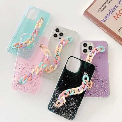 Silicone soft cover phone case with bracelet starry design in transparent, black, pink, or green for iPhone 14 and 15