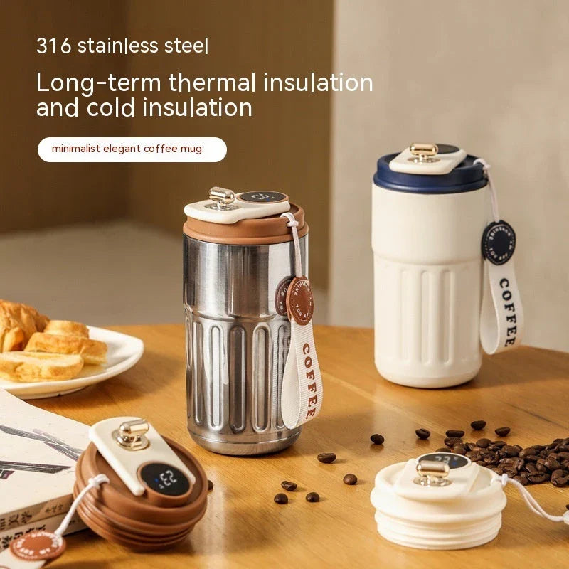 Portable digital stainless steel thermal bottle with temperature display, insulated for hot and cold drinks, designed for on-the-go use