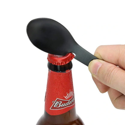 Silver stainless steel camping multitool with fork, spoon, serrated cutter, can opener, bottle opener, and keychain hole