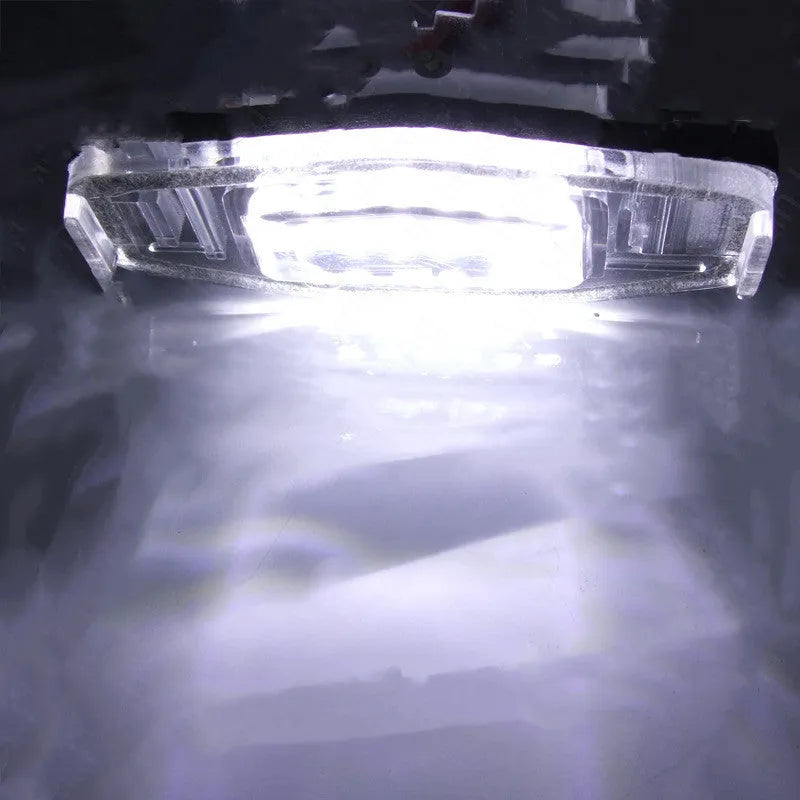 Honda Civic LED licence plate light showing white 6500-7000K illumination with plastic housing