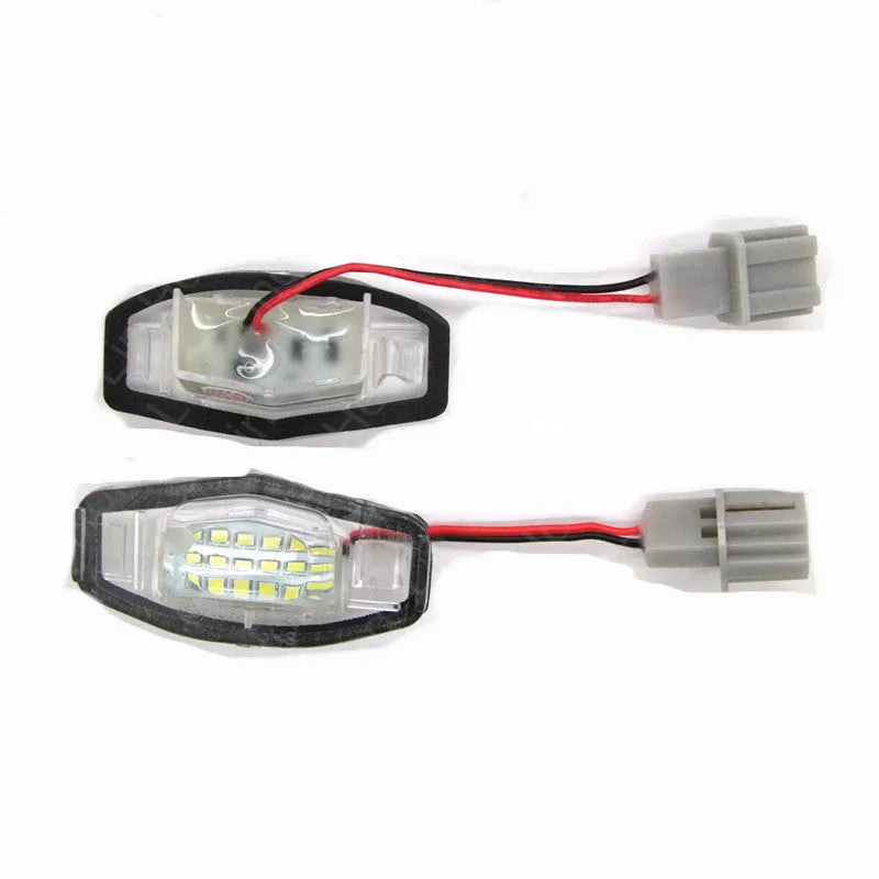 Honda Civic LED licence plate light showing white 6500-7000K illumination with plastic housing