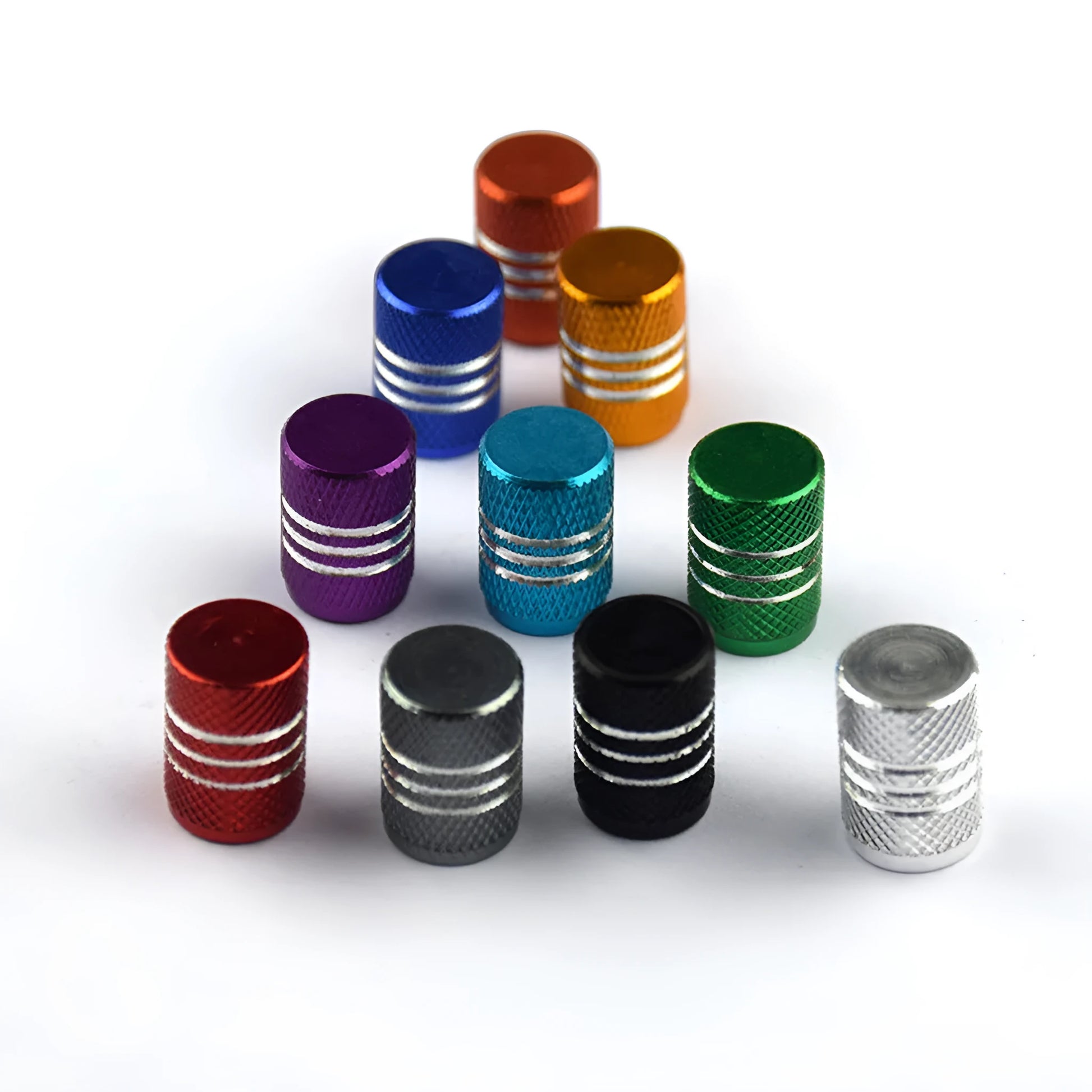 Set of stainless steel car tyre valve caps in multiple colours including black, red, blue, and gold.