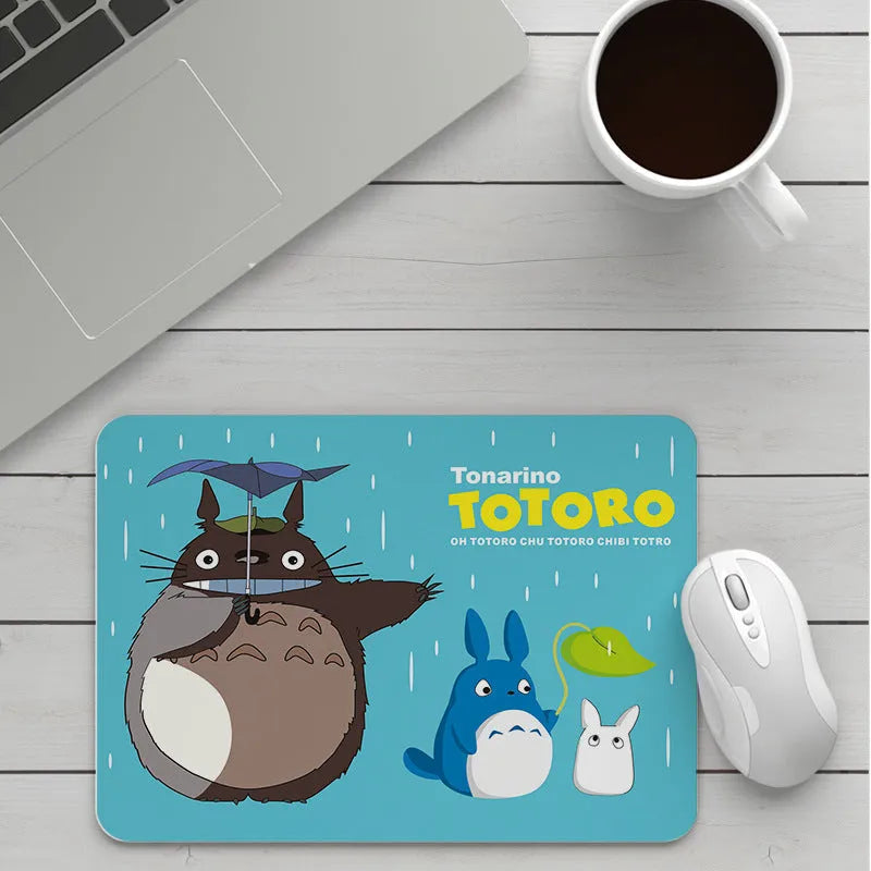 Customisable thick cartoon mouse pad with non-slip base, showing sample patterns like strawberry, cat, and whale designs.