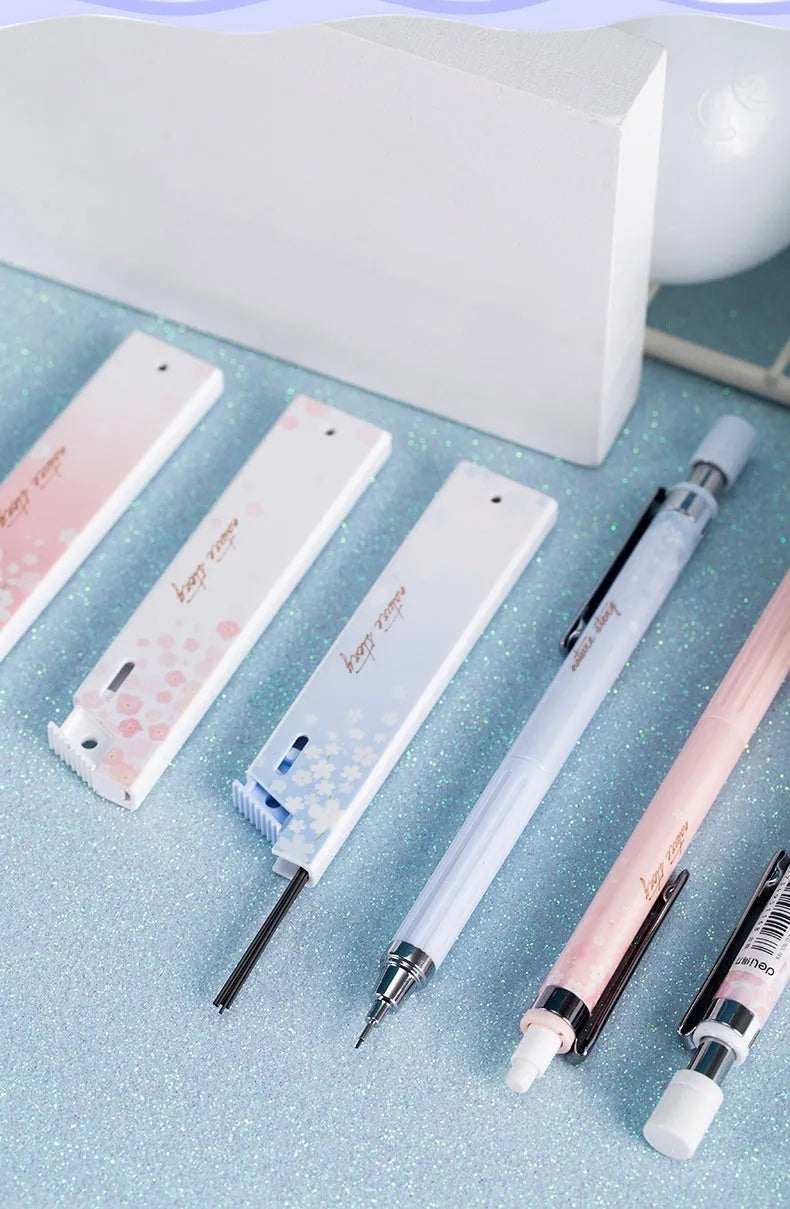 Simplified 0.5mm cartoon automatic pencil set with three pencils and refill boxes in mixed colours