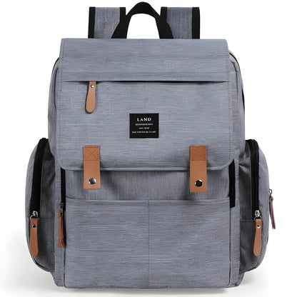 LAND Mommy large grey diaper backpack with changing mat, shown as a travel nappy bag.