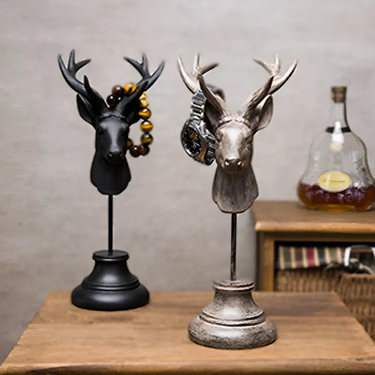 Natural resin animal sculpture home decoration in black, white, and wood colour finishes.