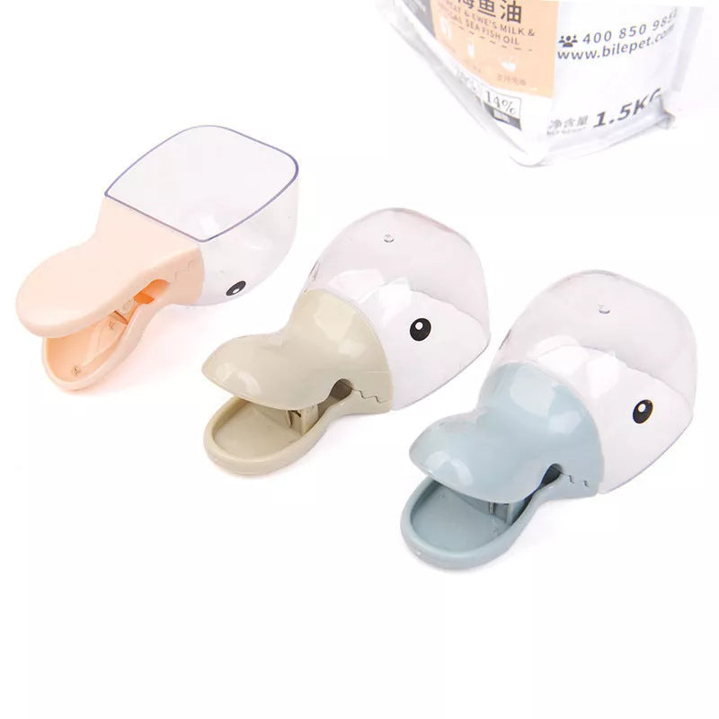 Multi-function cat food seal clip in light blue, light green, beige, and pink