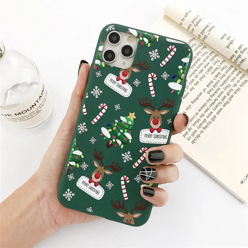 Christmas elk phone case with TPU material for iPhone 6 to 12 models featuring a green TPU back cover with cartoon stripes and festive Christmas tree elk design as a protective mobile phone cover