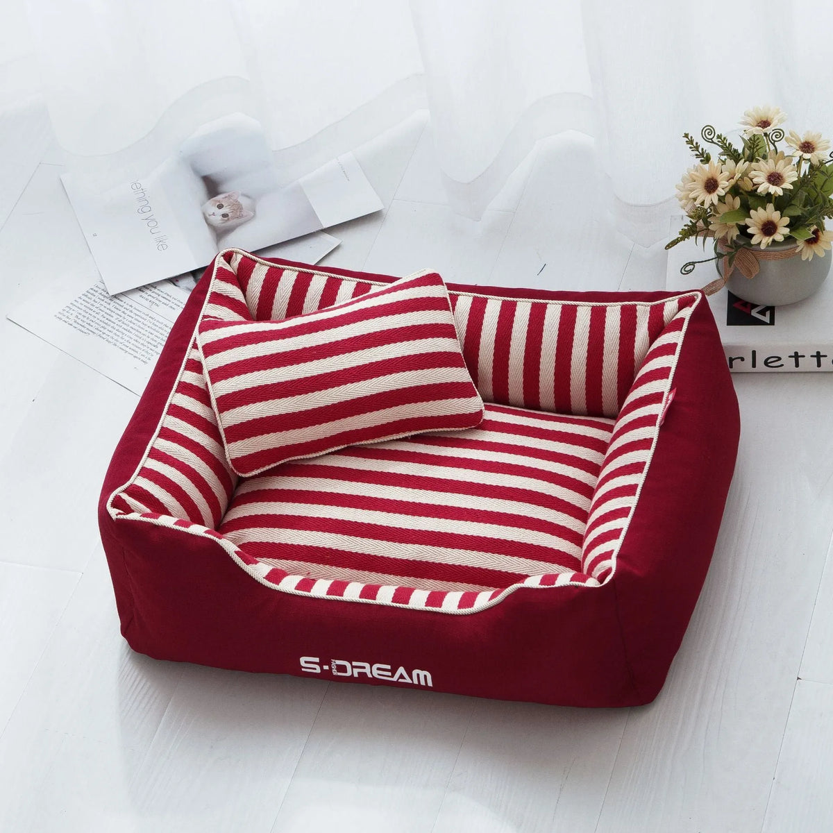 Navy striped removable dog kennel mat with a matching mini pillow, shown in blue and red colour options.