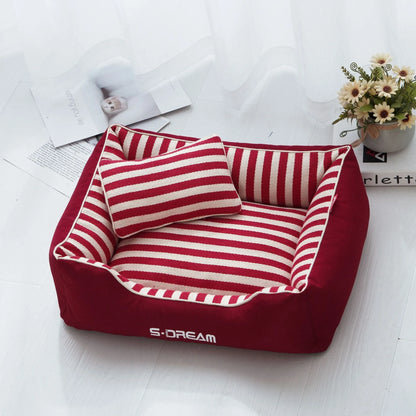Navy striped removable dog kennel mat with a matching mini pillow, shown in blue and red colour options.