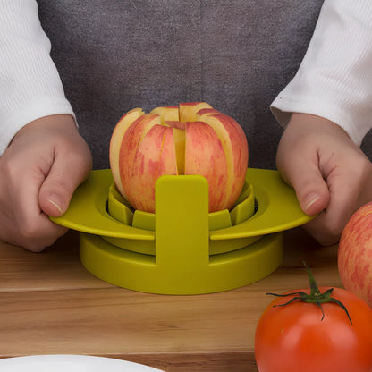 Green three-function fruit slicer for apples, tomatoes, and mangoes measuring 18.3cm