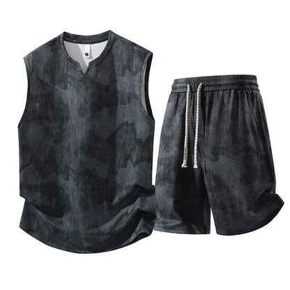 Man's casual sleeveless vest and shorts suit in a quick-drying fabric, shown in light denim blue.
