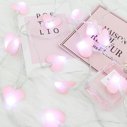LED string lights with fabric heart elements in pink or blue colour options