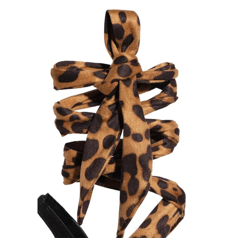 Light brown leopard print high heels with cross straps and 8cm fine heel on rubber sole