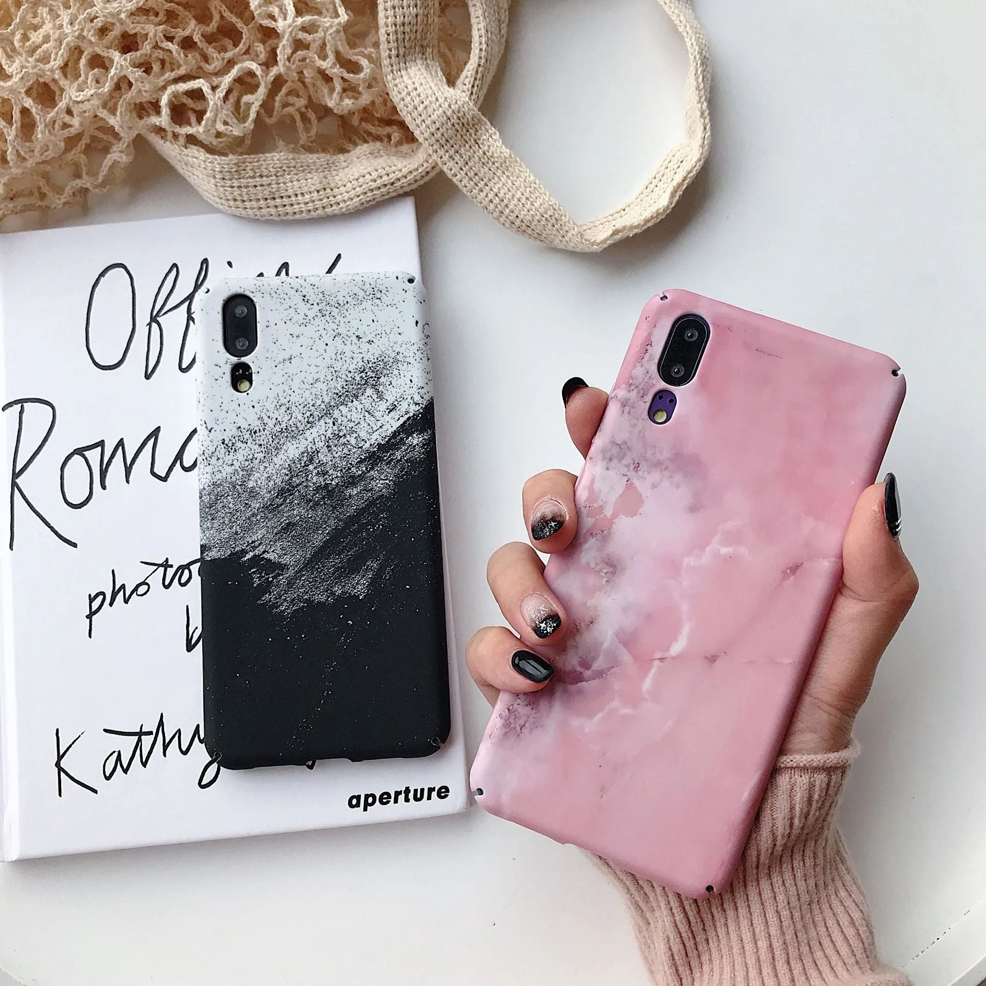 Black and pink painted hard PC phone cases for Honor and Huawei smartphones.