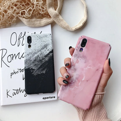 Black and pink painted hard PC phone cases for Honor and Huawei smartphones.