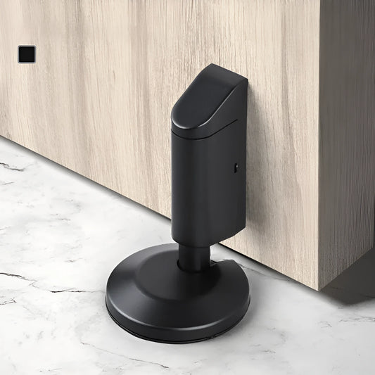 A modern invisible door stopper made from zinc alloy in a brushed gold finish.