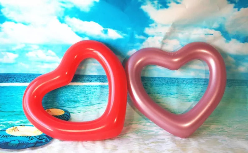 Oversized 120cm heart-shaped swim ring for adults in vibrant colors