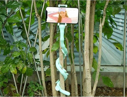 Lazy Bracket Flexible Phone Holder with 360° rotation in black, pink, and clear green