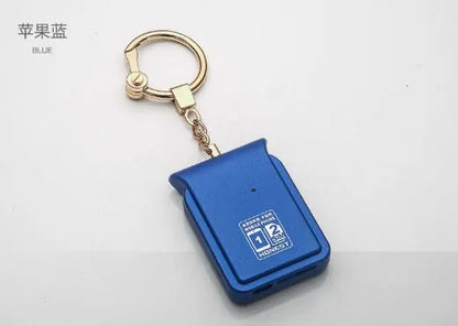 Bluetooth dual SIM adapter keychain in black leather with micro USB charging cable