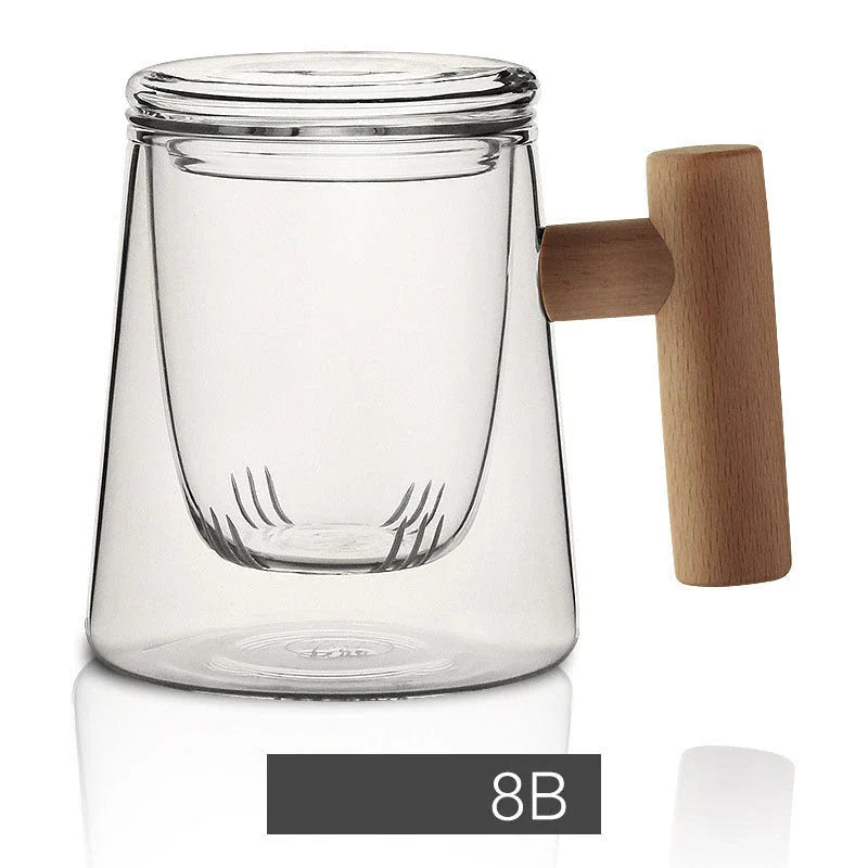 Premium glass tea infuser cup with wooden handle, offering a unique tea-water separation system and temperature-resistant construction for a refined tea experience.