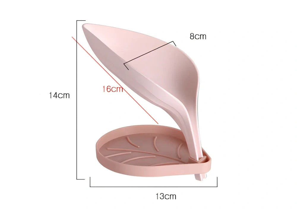 Blue bathroom soap dish with tree texture pattern and drainage channels on white ceramic sink