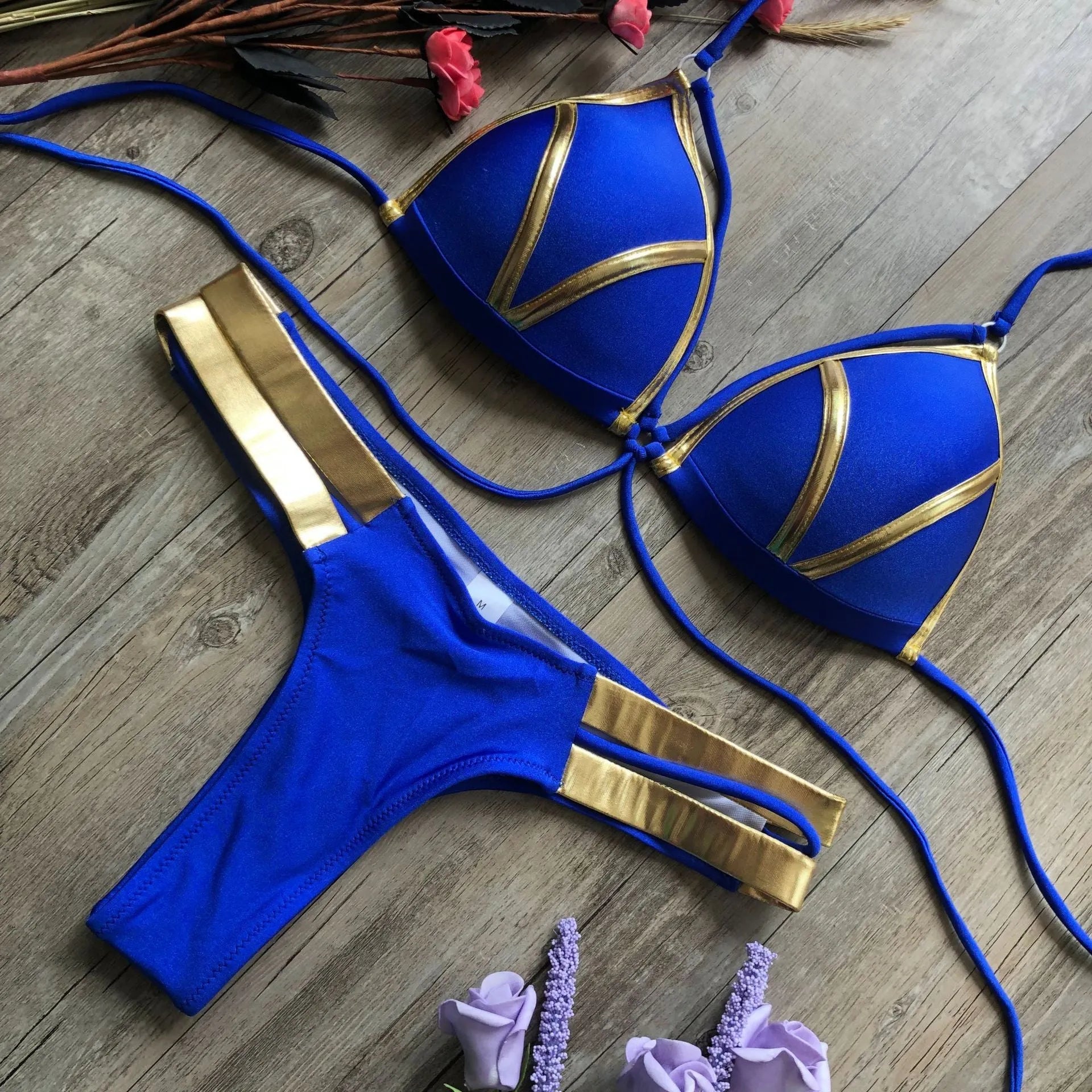 Women's bronzing bikini swimwear in nylon with cotton lining and chest pads