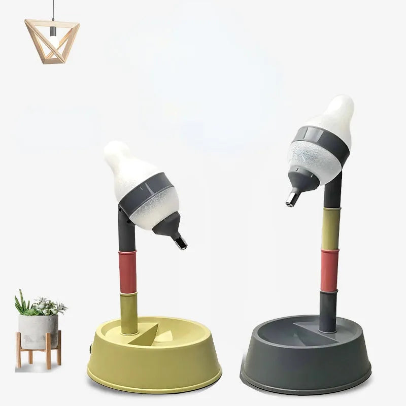 Adjustable height all-in-one pet waterer and feeder for cats and dogs, shown in grey or pink